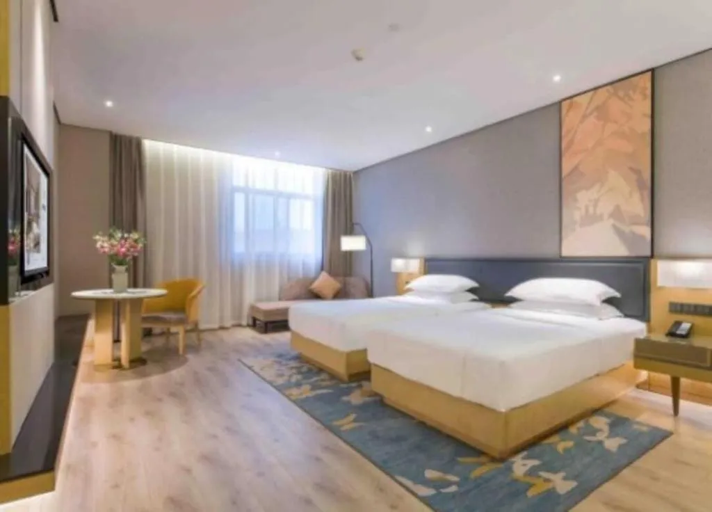 Bed in The Hotel V Nanjing Lishui