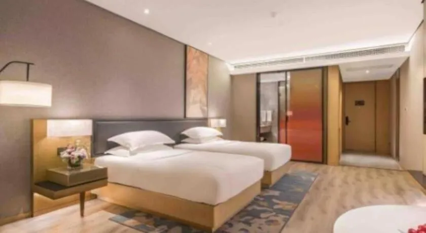 Bed in The Hotel V Nanjing Lishui