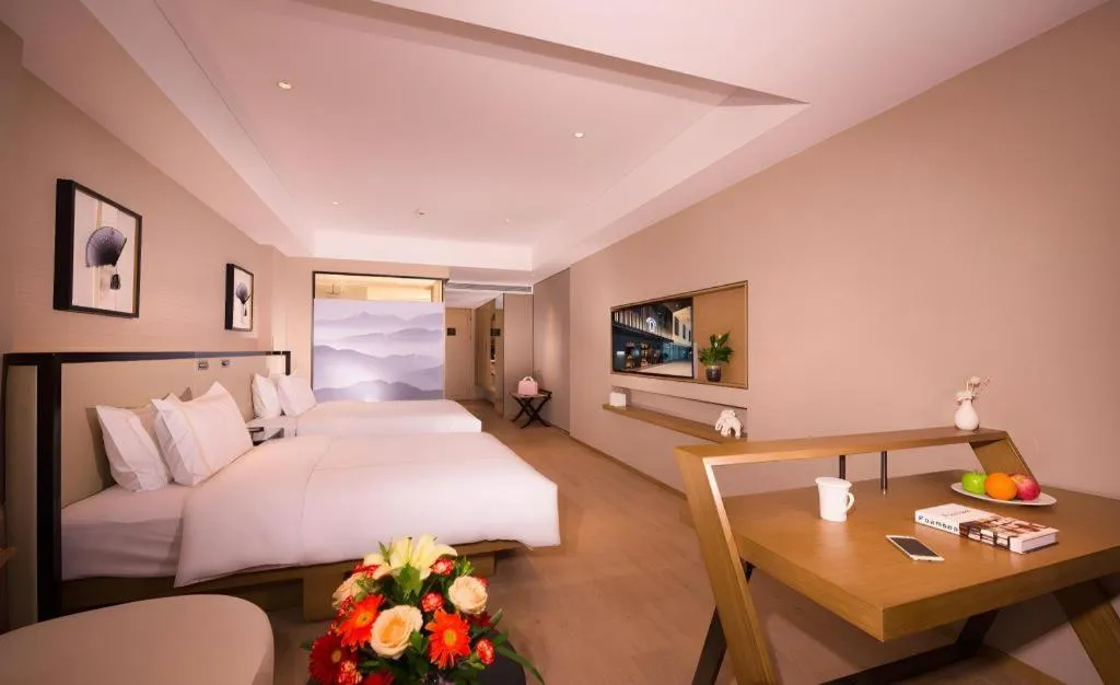 Bed in The Hotel V Nanjing Confucius Temple