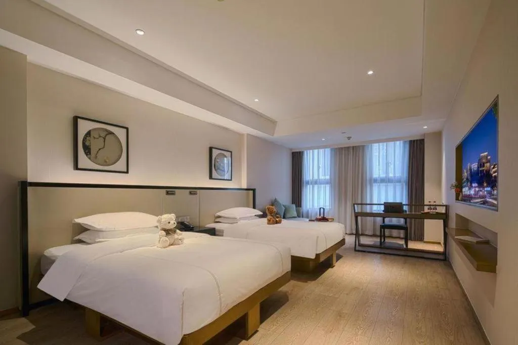 Bed in The Hotel V Nanjing Confucius Temple