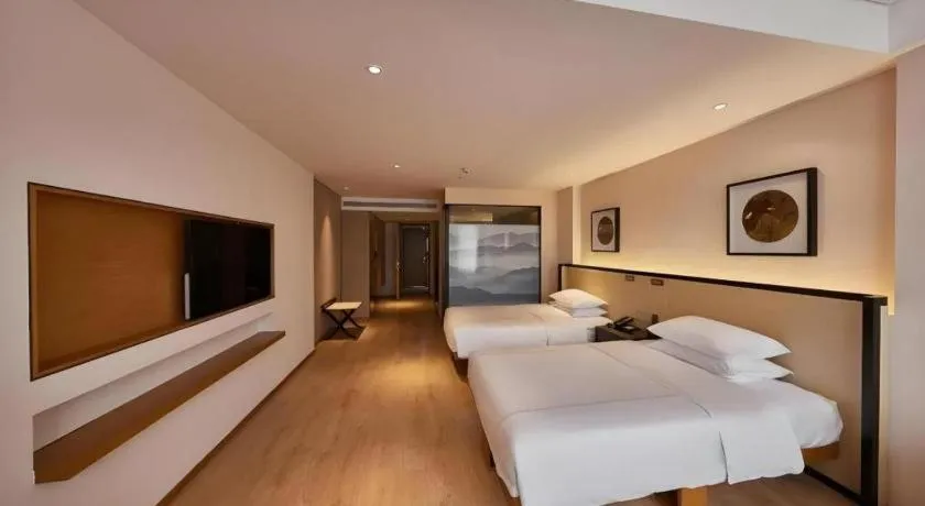 Bed in The Hotel V Nanjing Confucius Temple