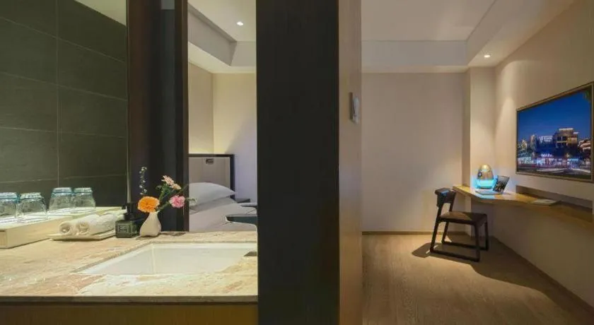 Bed in The Hotel V Nanjing Confucius Temple