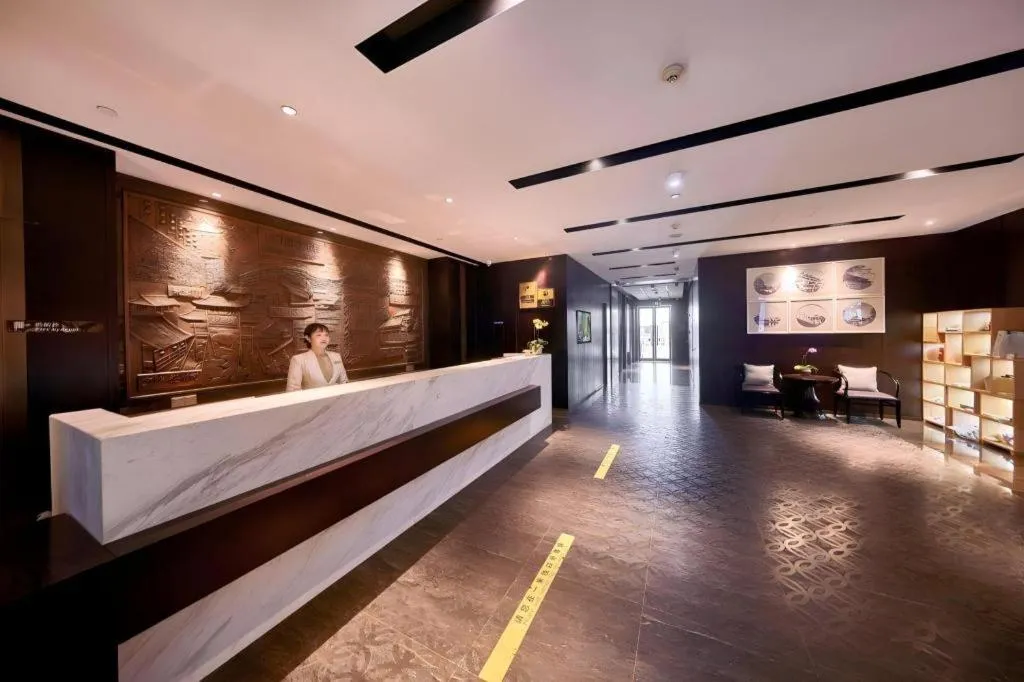 Bed in The Hotel V Nanjing Confucius Temple