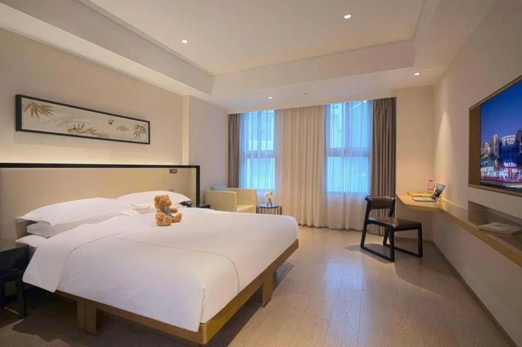 Bed in The Hotel V Nanjing Confucius Temple