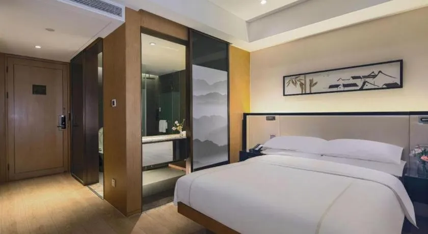 Bed in The Hotel V Nanjing Confucius Temple