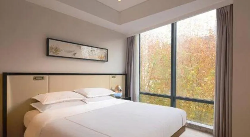 Bed in The Hotel V Nanjing Confucius Temple