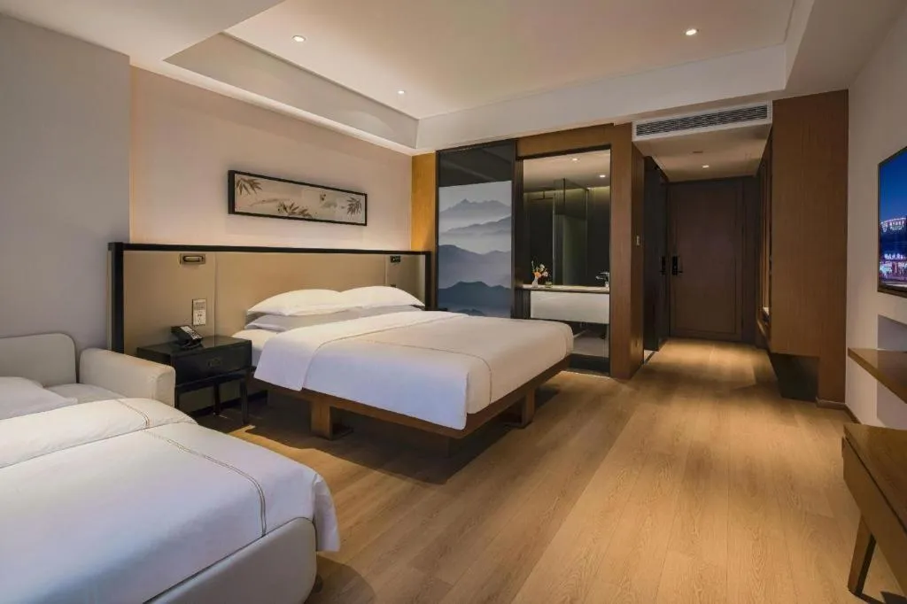 Bed in The Hotel V Nanjing Confucius Temple