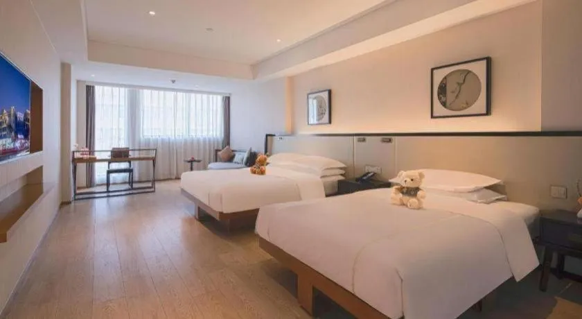 Bed in The Hotel V Nanjing Confucius Temple