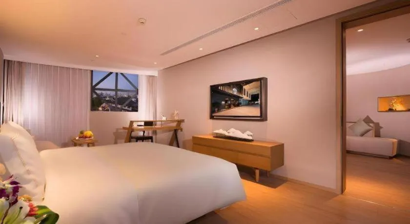 Bed in The Hotel V Nanjing Confucius Temple