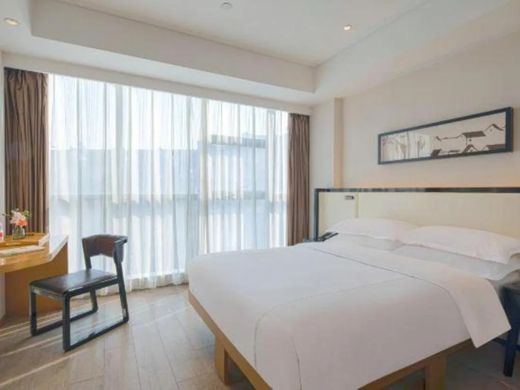 Bed in The Hotel V Nanjing Confucius Temple