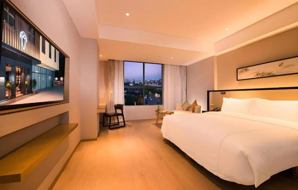 Bed in The Hotel V Nanjing Confucius Temple