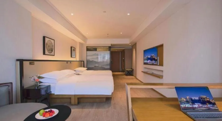 Bed in The Hotel V Nanjing Confucius Temple