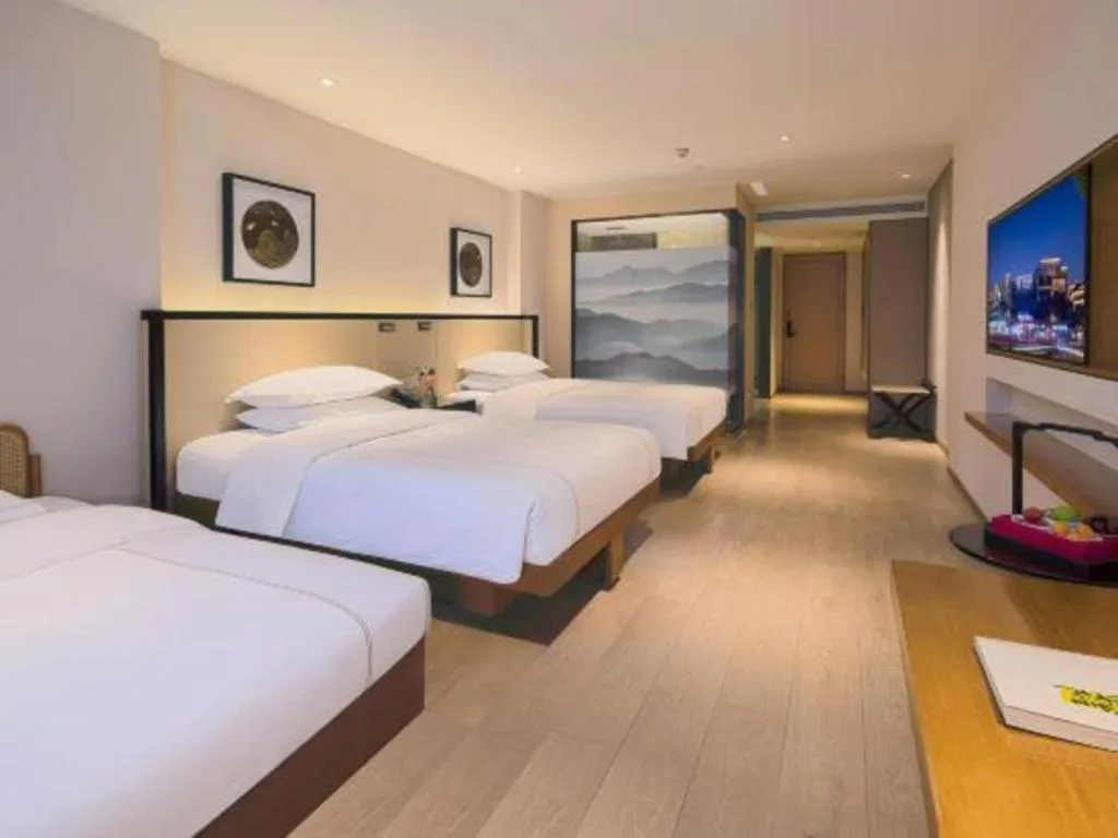 Bed in The Hotel V Nanjing Confucius Temple