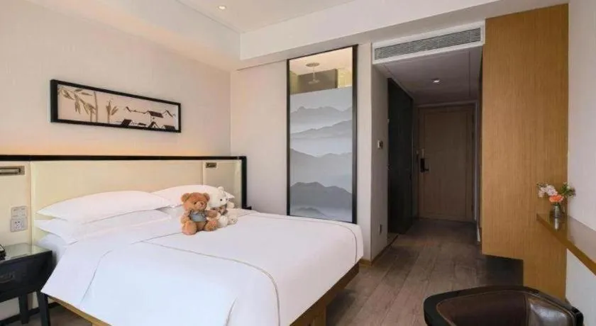 Bed in The Hotel V Nanjing Confucius Temple