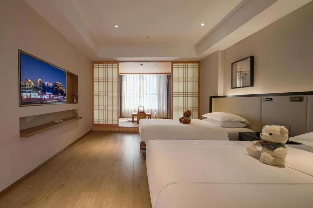 Bed in The Hotel V Nanjing Confucius Temple