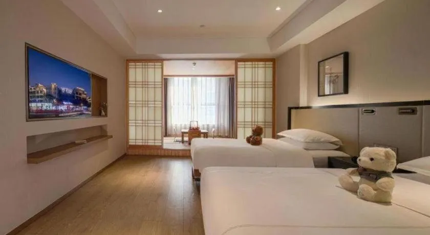 Bed in The Hotel V Nanjing Confucius Temple