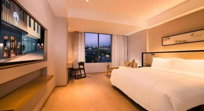 Bed in The Hotel V Nanjing Confucius Temple