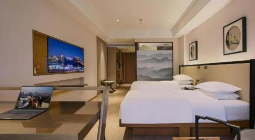 Bed in The Hotel V Nanjing Confucius Temple