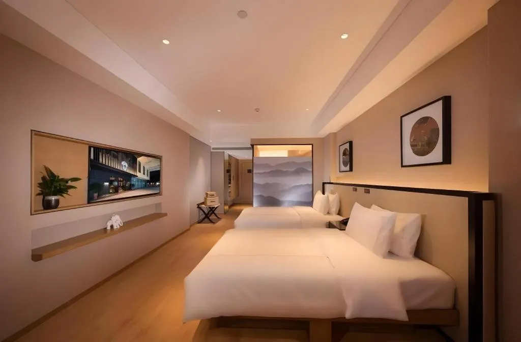 Bed in The Hotel V Nanjing Confucius Temple