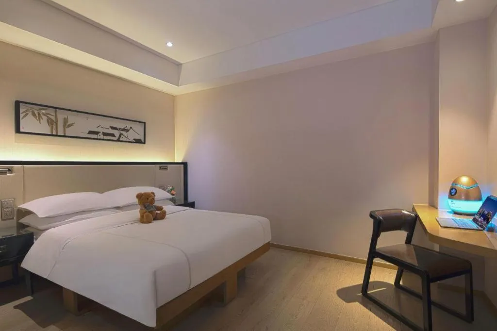 Bed in The Hotel V Nanjing Confucius Temple