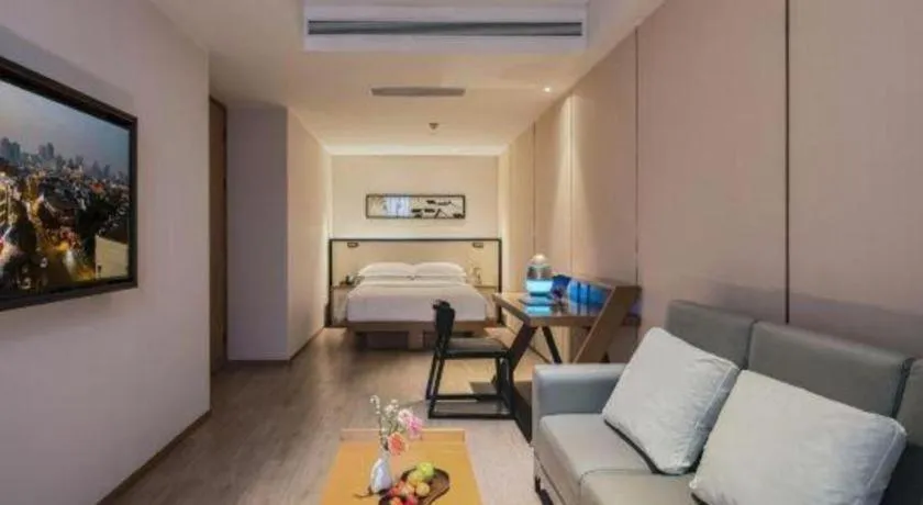 Bed in The Hotel V Nanjing Confucius Temple