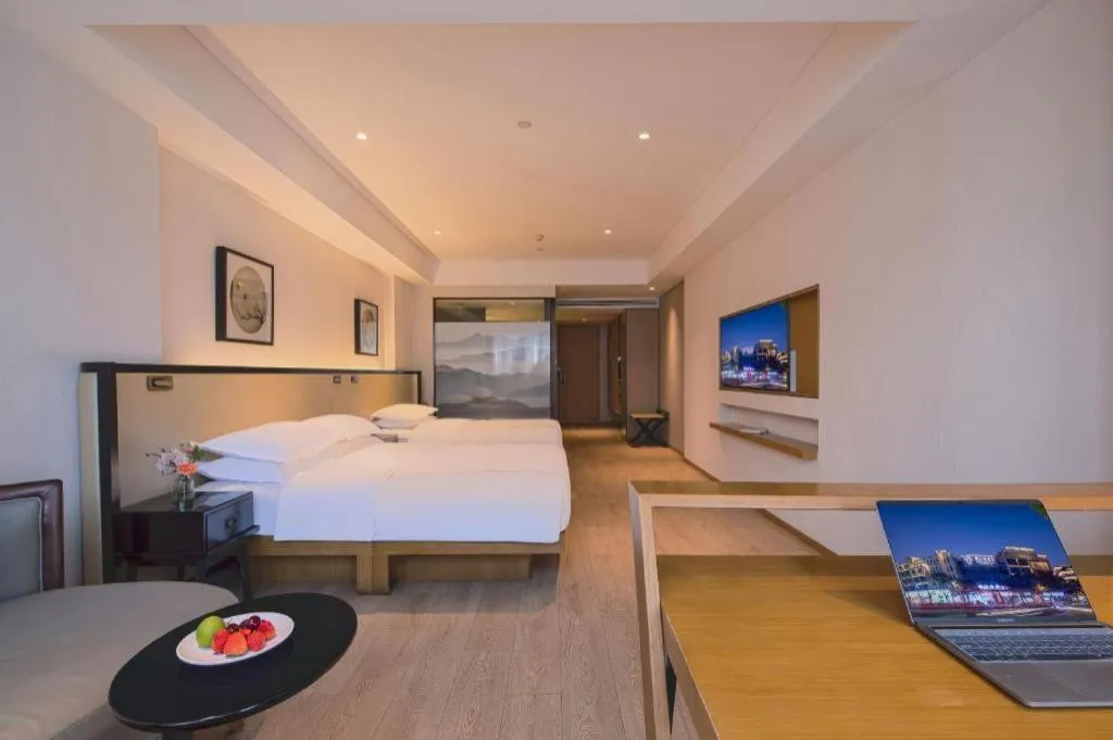 Bed in The Hotel V Nanjing Confucius Temple