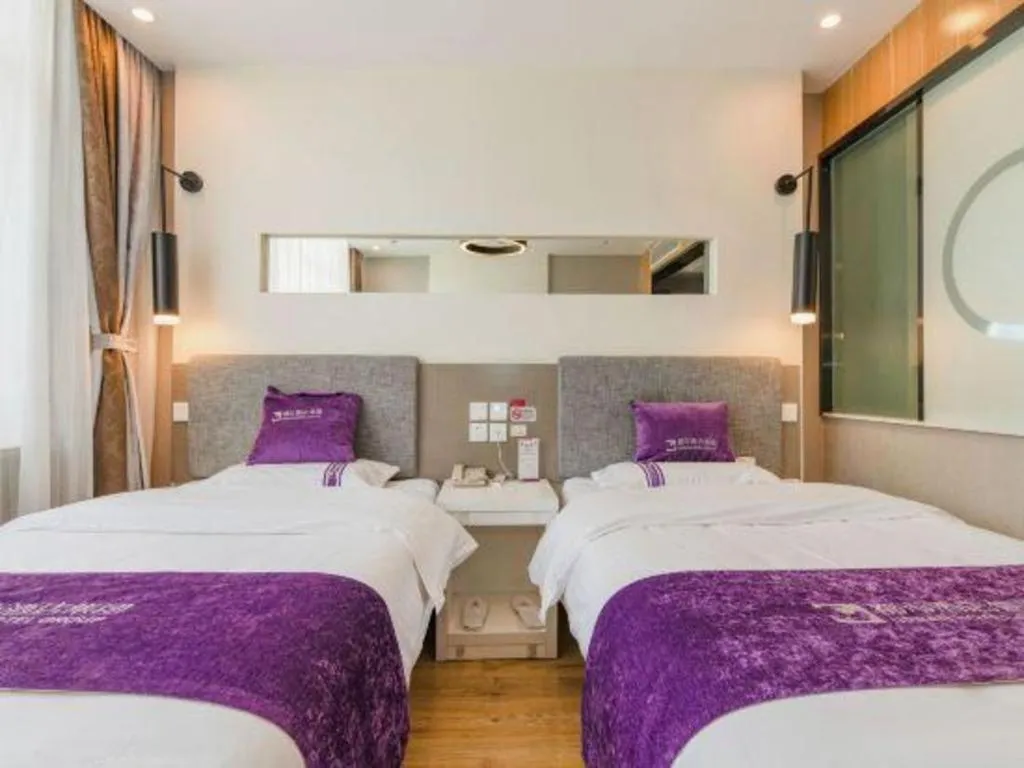 Bed in City 118 Hotel Qingdao Boardcast Tower