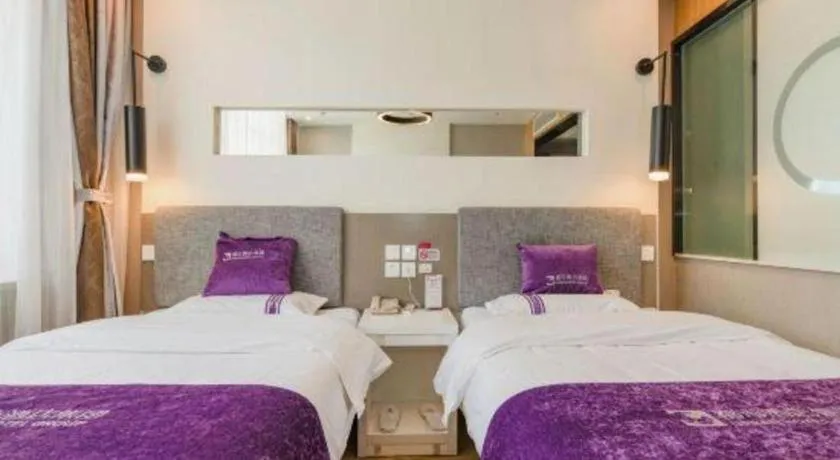 Bed in City 118 Hotel Qingdao Boardcast Tower