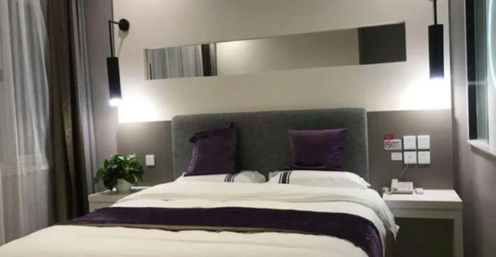 Bed in City 118 Hotel Qingdao Boardcast Tower