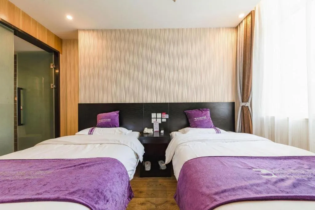 Bed in City 118 Hotel Qingdao Boardcast Tower