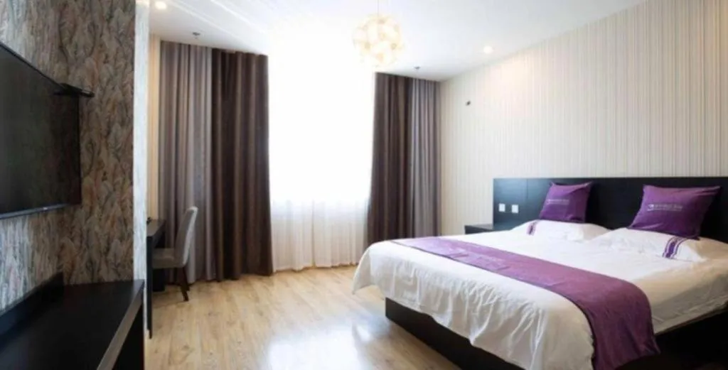 Bed in City 118 Hotel Qingdao Boardcast Tower