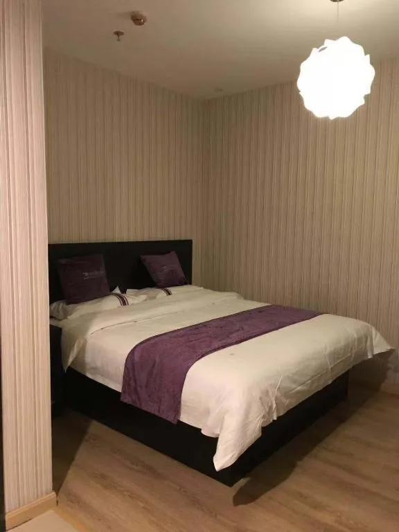 Bed in City 118 Hotel Qingdao Boardcast Tower