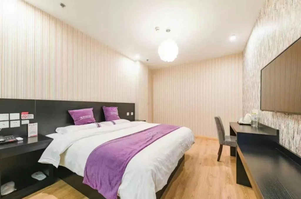 Bed in City 118 Hotel Qingdao Boardcast Tower