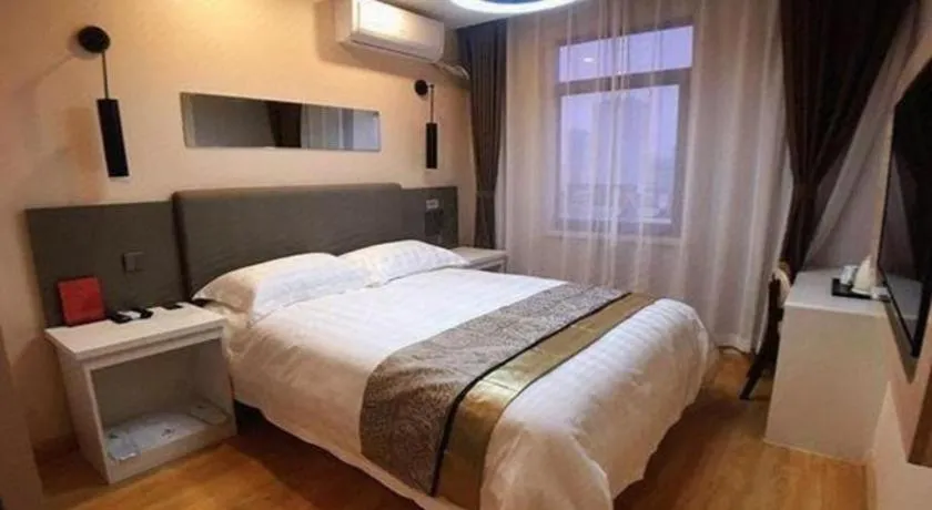 Bed in City 118 Hotel Qingdao Boardcast Tower