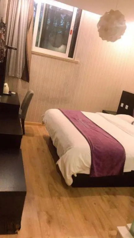 Bed in City 118 Hotel Qingdao Boardcast Tower