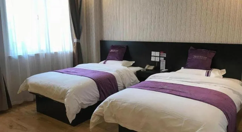 Bed in City 118 Hotel Qingdao Boardcast Tower
