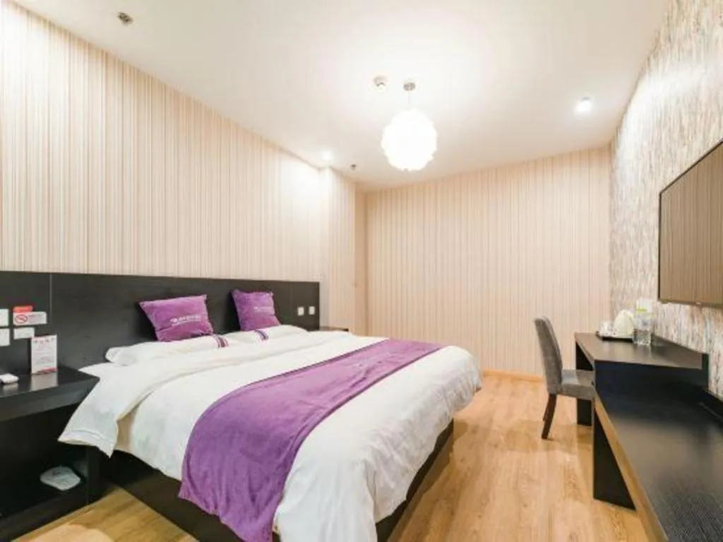 Bed in City 118 Hotel Qingdao Boardcast Tower