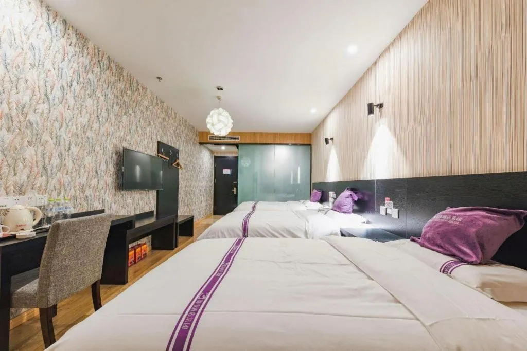 Bed in City 118 Hotel Qingdao Boardcast Tower
