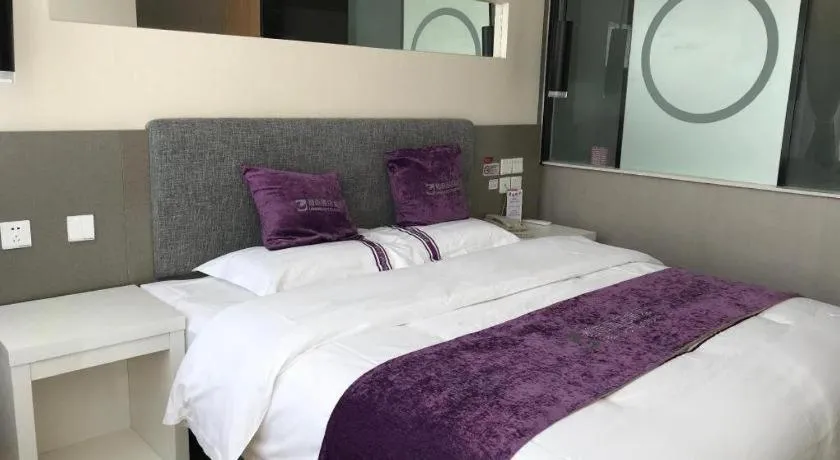 Bed in City 118 Hotel Qingdao Boardcast Tower