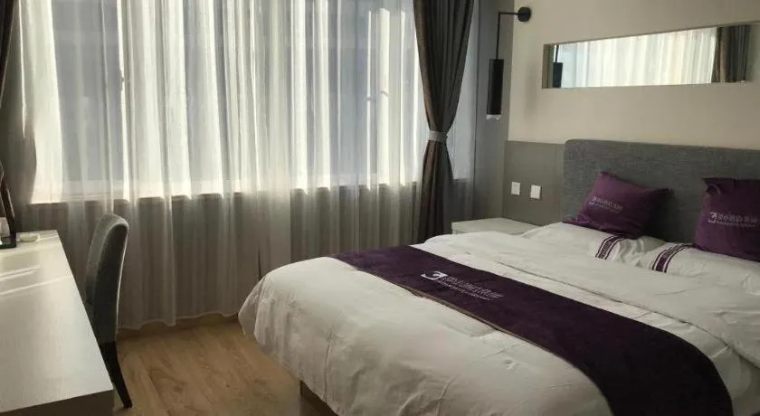 Bed in City 118 Hotel Qingdao Boardcast Tower