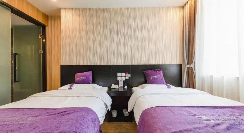 Bed in City 118 Hotel Qingdao Boardcast Tower