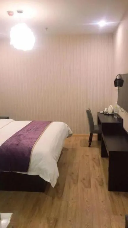 Bed in City 118 Hotel Qingdao Boardcast Tower