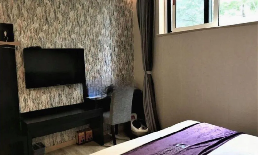 Bed in City 118 Hotel Qingdao Boardcast Tower