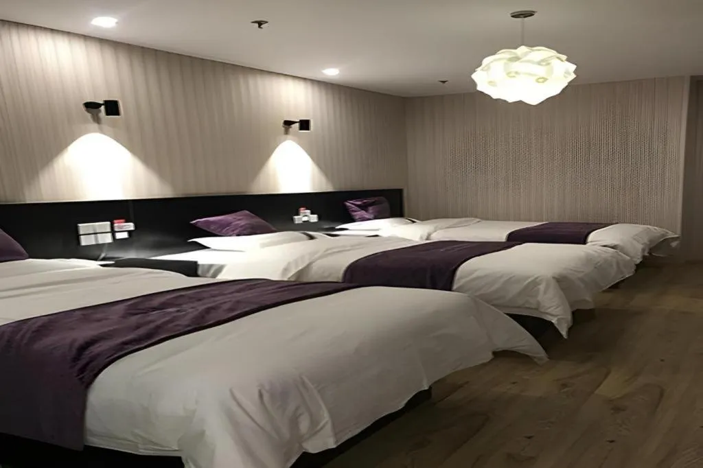 Bed in City 118 Hotel Qingdao Boardcast Tower