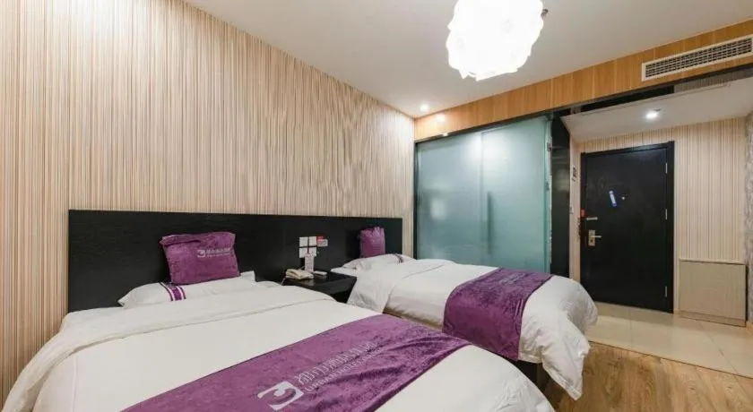 Bed in City 118 Hotel Qingdao Boardcast Tower