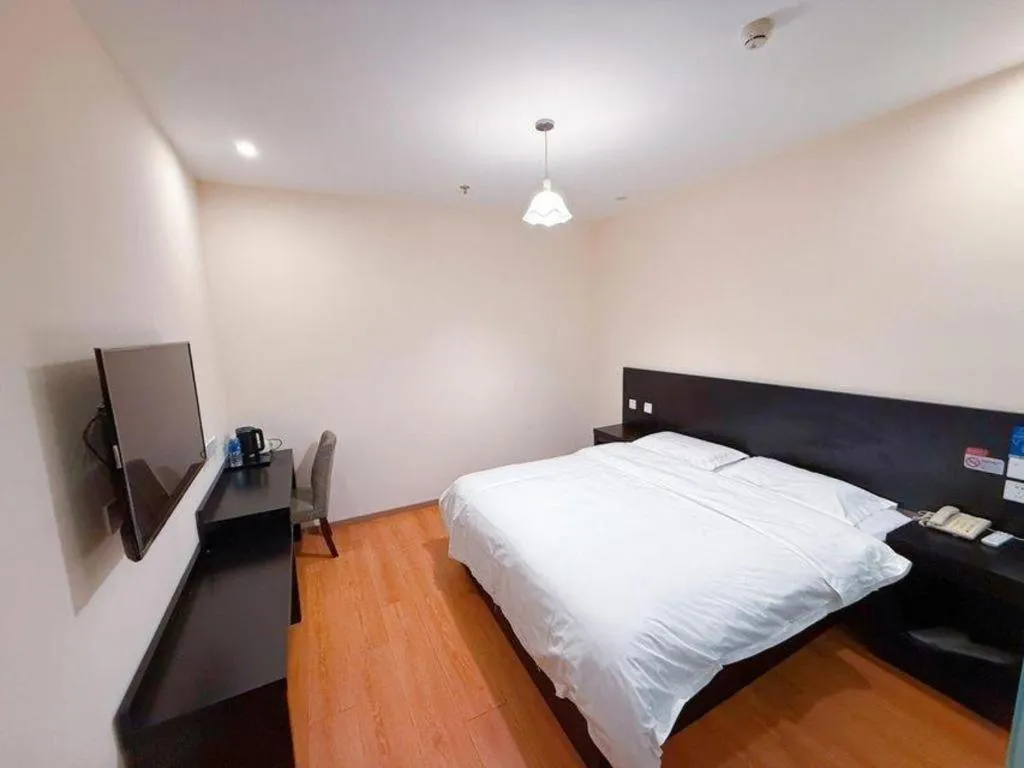 Bed in City 118 Hotel Qingdao Boardcast Tower