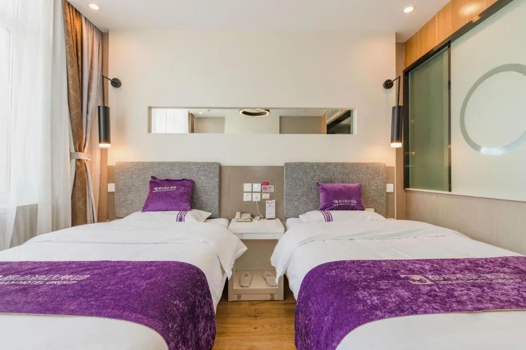 Bed in City 118 Hotel Qingdao Boardcast Tower