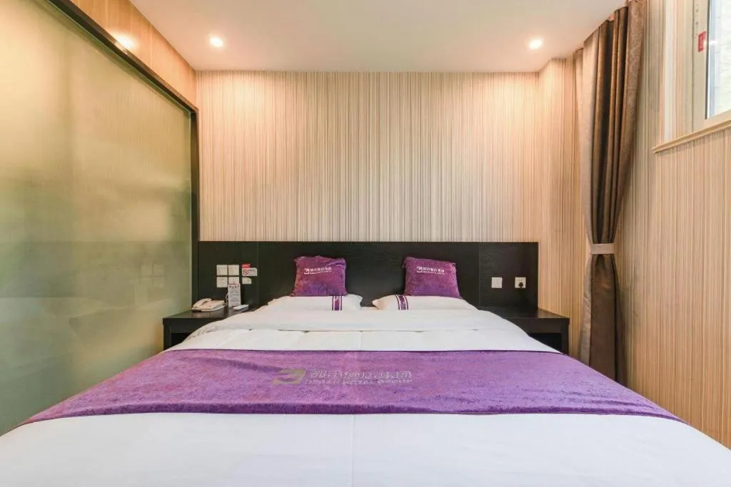 Bed in City 118 Hotel Qingdao Boardcast Tower