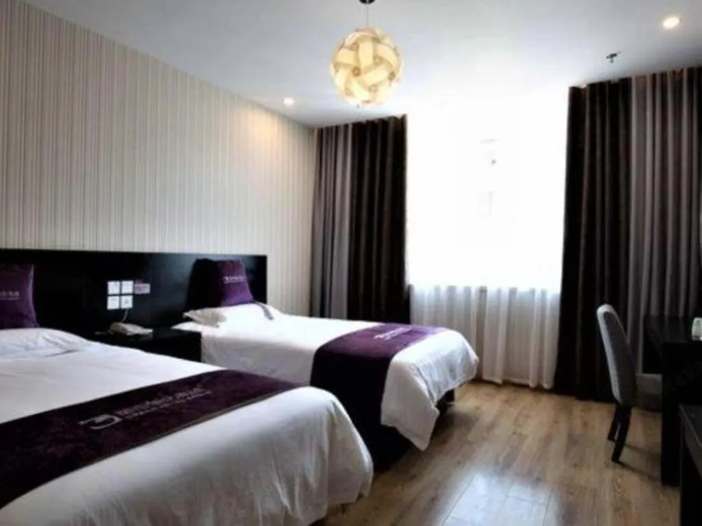 Bed in City 118 Hotel Qingdao Boardcast Tower