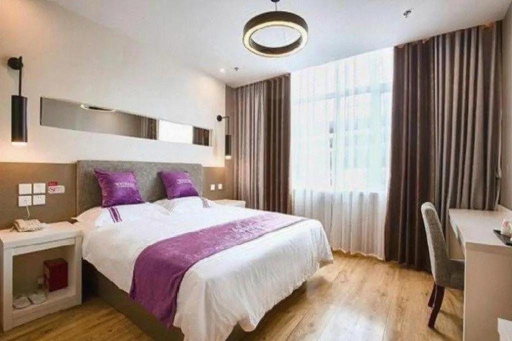 Bed in City 118 Hotel Qingdao Boardcast Tower